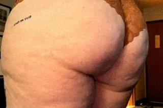 Sexi redheaded milf with a round booty and juicy pink pussy photo 2