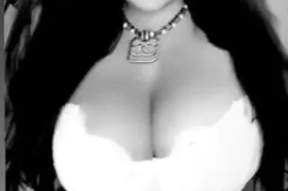 busty blue eyed beauty photo 2