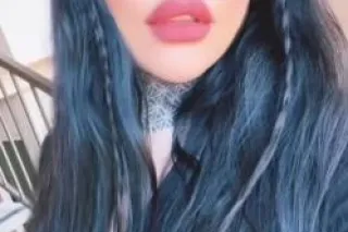 busty blue eyed beauty